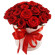 красные розы в шляпной коробке. Таджикистан